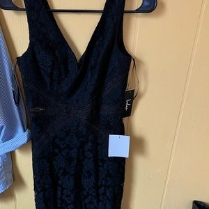 Lulus formal dress. I have 2 sizes small and med. so comfortable